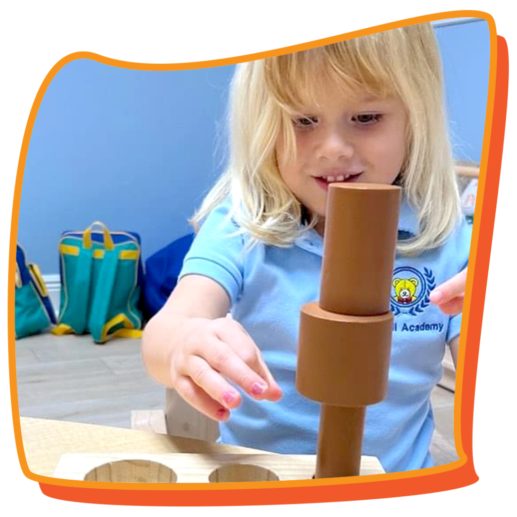 3-year-old girl playing with blocks
